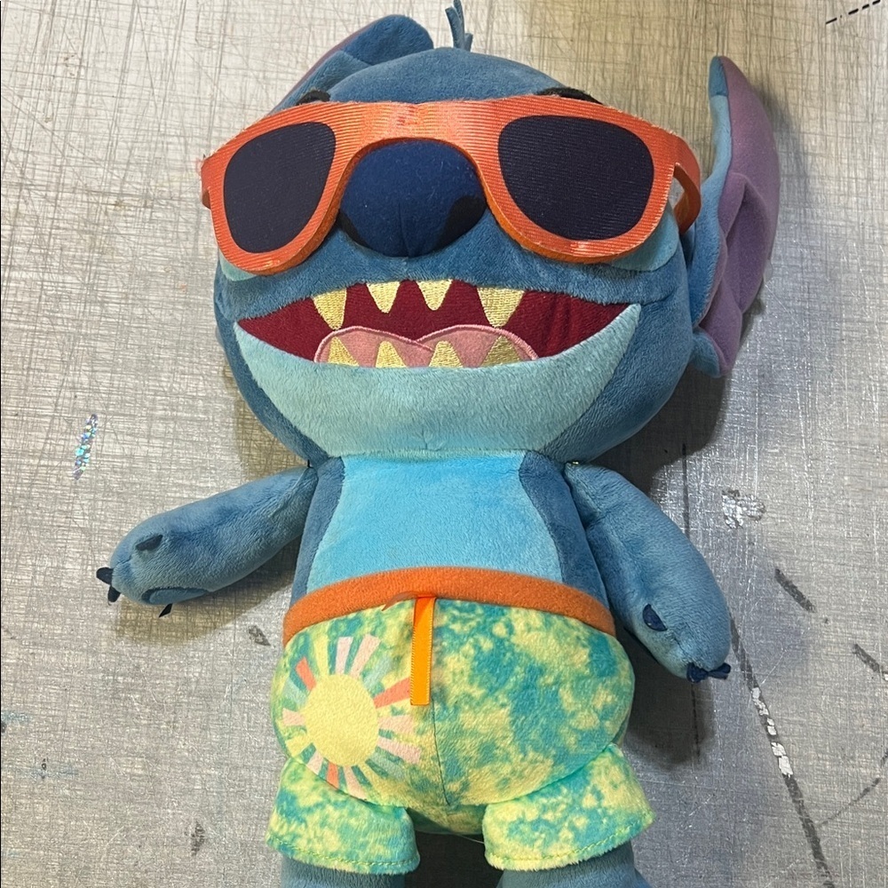Disney Blue Plush Toy with Orange Sunglasses